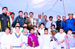 The Sports Trainees team pose with the trophy of the First Triangular Series in Dehradun on Wednesday