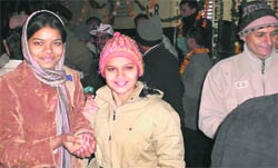 Women passengers after alighting from an all-women train in Sonepat
