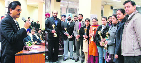 Sessions Judge SP Bangarh addresses lawyers at the district court complex and (right); newly appointed judges after being felicitated by the District Bar Association at the district court complex in Ludhiana on Wednesday.