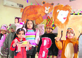 Tiny tots of Maple Bear Canadian Play Way and Nursery School present alphabet modelling in Ludhiana on Wednesday.