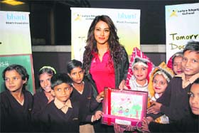Bipasha Basu with the children of Satya Bharti School