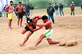 Close encounter: A kabaddi match in progress at the inter-college championship being organised in DAV College, Bathinda