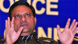 Police Commissioner Brijesh Gupta addresses a press conference in New Delhi on Thursday.