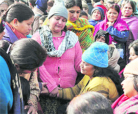 Relatives of victims mourn in Haridwar on Thursday.