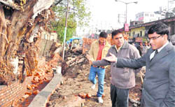 City Magistrate R Shreedhar Babu inspects construction work at a site near the Haridwar railway station.