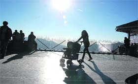 Tourists enjoy a sunny day in Shimla on Thursday. 