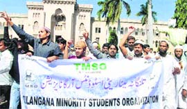 Members of the Telangana Minority Students Organisation raise slogans demanding a separate Telangana state in Hyderabad on Thursday.