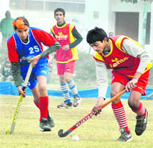 A hockey match in progress between Sansarpur and Sarinh near Jalandhar Cantonment on Thursday