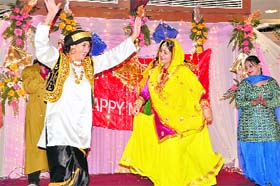 Members of the Astha Ladies Club perform dance ahead of the Lohri celebrations in Ludhiana