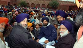 SAD president and Deputy CM Sukhbir Singh Badal at a meeting with party workers at his residence in Badal village on Friday.