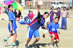 Hockey and handball matches in progress at the Rajya Yuva Kalyan Parishad Games in Dehradun on Friday