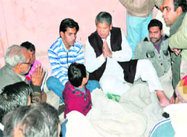 Haridwar MP Harish Rawat consoles a bereaved family in Haridwar 