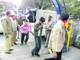 The students in police custody in Dharamsala on Friday. 