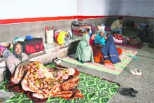 Attendants outside a ward in Government Medical College and Hospital in Jammu. 