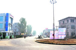 A view of commercial complexes in Sangrur along Sangrur-Patiala National Highway