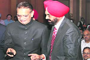 Kanwar Sandhu (right), on Day and Night news channel, has kept the debate focussed on the impact of WikiLeaks exposé on the process of information gathering