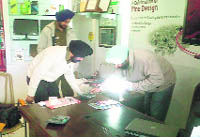 Police officials examine the crime scene at Sector 34, Chandigarh, on Saturday
