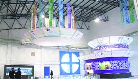 An exhibition on tourism and the Winter Games being put up at the ice-skating rink in Dehradun.
