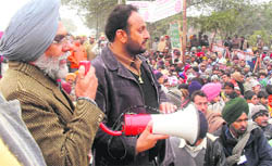 Dera Sacha Sauda followers hold a protest in front of the court complex in Sirsa on Saturday.