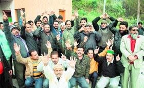 Members of the J&K Government Employees Joint Action Committee stage a protest in Jammu on Saturday.