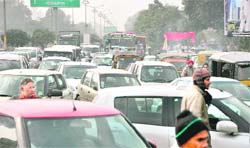 The traffic chaos which resulted due to the laying of the cables near Prof Mohan Singh Chowk in Ludhiana on Saturday.