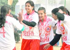 Delhi eves celebrate their win over Chandigarh on the second day of the Senior National Throwball Championship in Ludhiana on Saturday