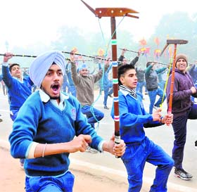 Students from schools in Punjab rehearse for the Republic Day function in New Delhi on a foggy Saturday morning. 