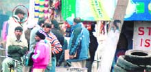 UT SSP Naunihal Singh (encircled) at the STD booth from where the suspected kidnapper of Khushpreet made the call for ransom. T