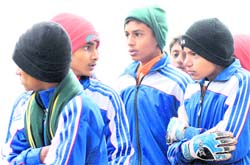 Players from the South brave the chill during the 56th National School Games in Chandigarh. 