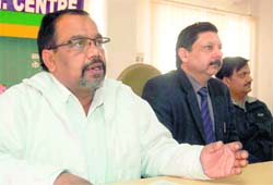 Dr DP Joshi, general secretary, PMHS, addresses a press conference in Dehradun