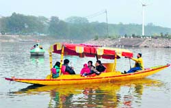 Tourists at Sukhna Lake make the most of a lazy Sunday