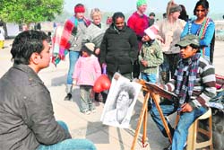 Tourists at Sukhna Lake make the most of a lazy Sunday.