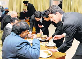 Students of the University Institute of Hotel Management and Tourism (UIHMT) cater to the UGC team members at Panjab University in Chandigarh