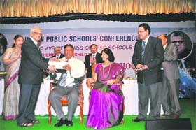 VK Verma (on the chair) receiving the Lifetime achievement award from Dr Vinay Kashyap at Udupi