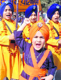 A nagar ksirtan procession being taken out on the eve of birth anniversary of Guru Gobind Singh in Patiala on Monday.