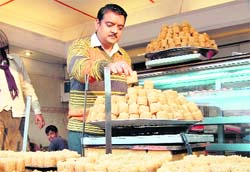 Not so sweet: As prices soar high, sweet shops in Amritsar are getting a few customers these days.