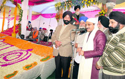Uttarakhand Chief Minister Ramesh Pokhriyal Nishank addresses a gathering of devotees at the Parkash Utsav of Sikh Guru Gobind Singh at Race Course in Dehradun on Tuesday