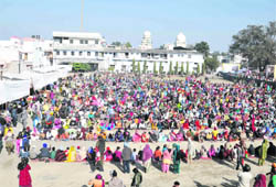 Devotees partake langar during Gurpurb celebrations in Dehradun on Tuesday