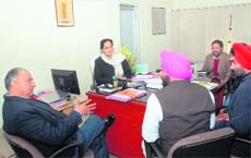 National-level monitor Jagdish Kumar visits ADC(D) Sarojini Gautam Shardas office in Jalandhar on Tuesday. 