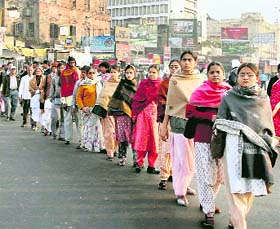 People march during a rally demanding immediate release of doctor-activist Binayak Sen in Kolkata on Tuesday. 
