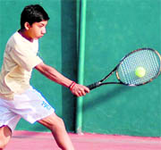A player in action at the All-India Talent Series Tennis Tournament in Dehradun on Wednesday
