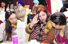 Delegates from Thailand discuss a point at a Parvasi Divas function in Chandigarh on Wednesday.