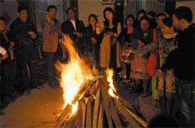 Spreading warmth: The residents of Veer Colony celebrate Lohri around a bonfire on Thursday in Bathinda
