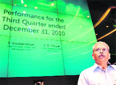Infosys CEO S. Gopalakrishnan announces the company's financial results in Bangalore on Thursday.