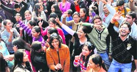 Students dance at a function on the occasion of Lohri at Panjab University on Thursday.
