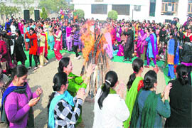 Students and staff members of Khalsa College for Women celebrate Lohri in Amritsar