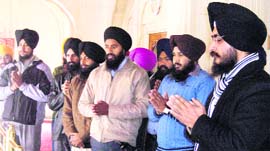 Members of the Sikh Youth of Punjab hold an ardaas at Akal Takht in Amritsar.