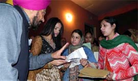 MP from Brampton, Canada, Ruby Dhalla with LBP President Balwant Singh Ramuwalia at Ramuwala Nawan village in Moga on Friday.