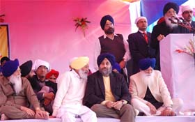 Chief Minister Parkash Singh Badal addressing the political conference of the SAD (B) organised at the Maghi Mela in Muktsar on Friday. Also seen in the picture are (from left in front row) SGPC chief Avtar Singh Makkar, MP Balwinder Singh Bhunder, Deputy Chief Minister Sukhbir Badal and Jathedar Tota Singh.