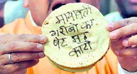 A Samajwadi Party worker protests against Mayawati in Allahabad.
